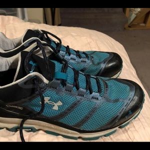 Pair of under armor running sneakers